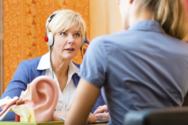 Woman takes a hearing test